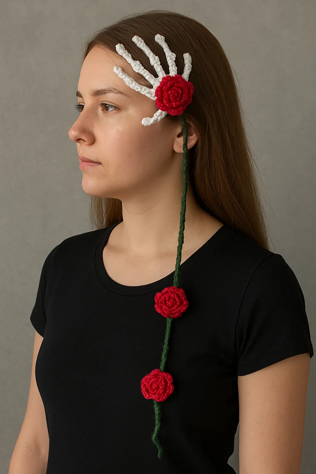 Skeleton hand hair clip with red cascading crochet flowers